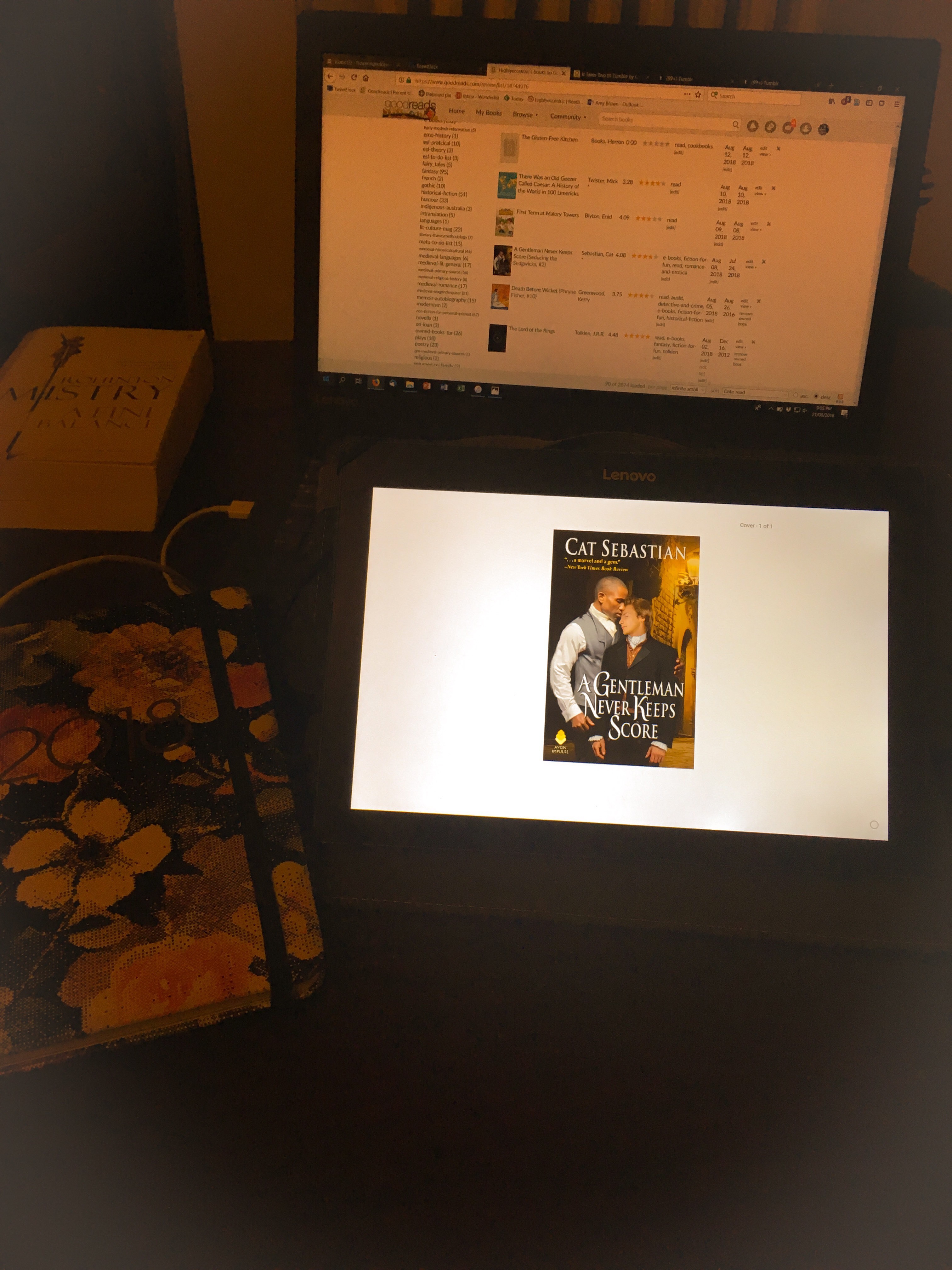 Gentleman Score Image of tablet showing Cat Sebastian's 'A Gentleman Never Keeps Score', with computer and other books in background